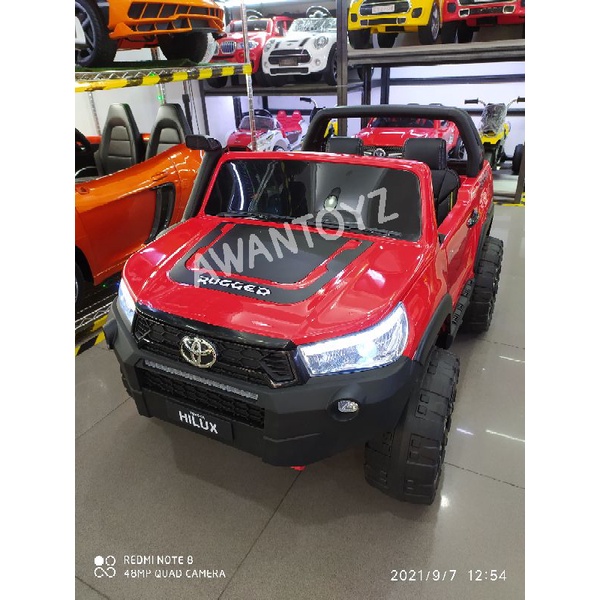 Mobil Aki Anak Toyota Hilux Red