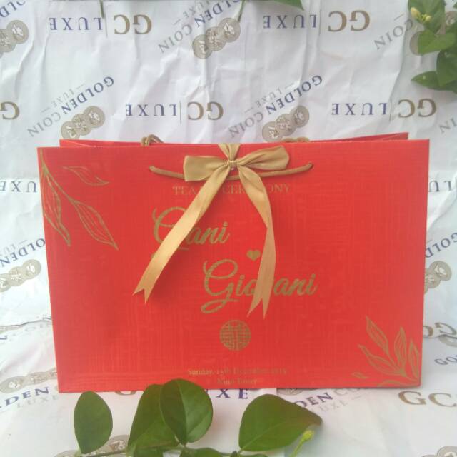 

Paperbag warna merah imlek engagement pertunangan pernikahan,dll murah dan berkualitas