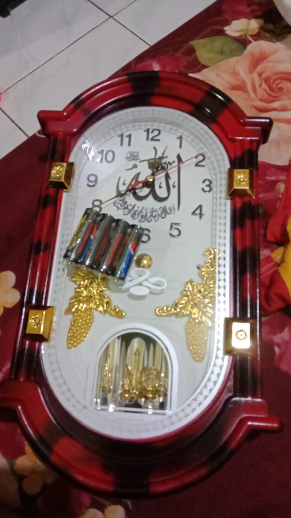 Jam Dinding Unik Bunyi Komedi Putar