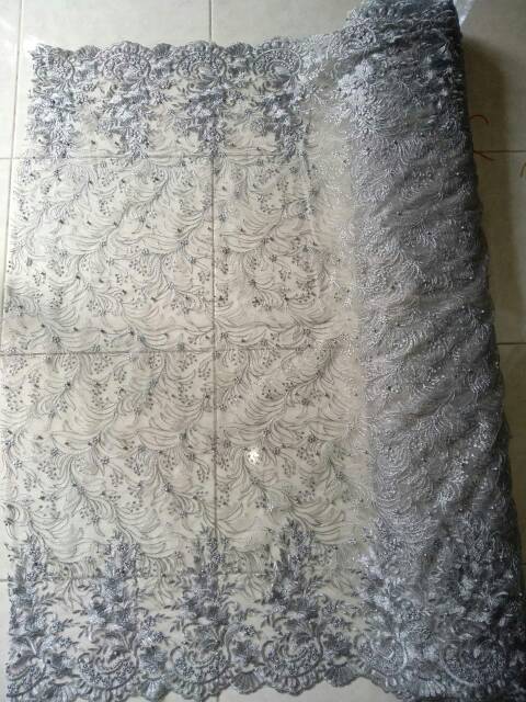 Tile akar mutiara dengan tumpal