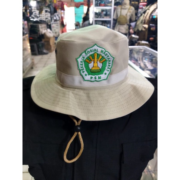 topi psm pekerja sosial masyarakat