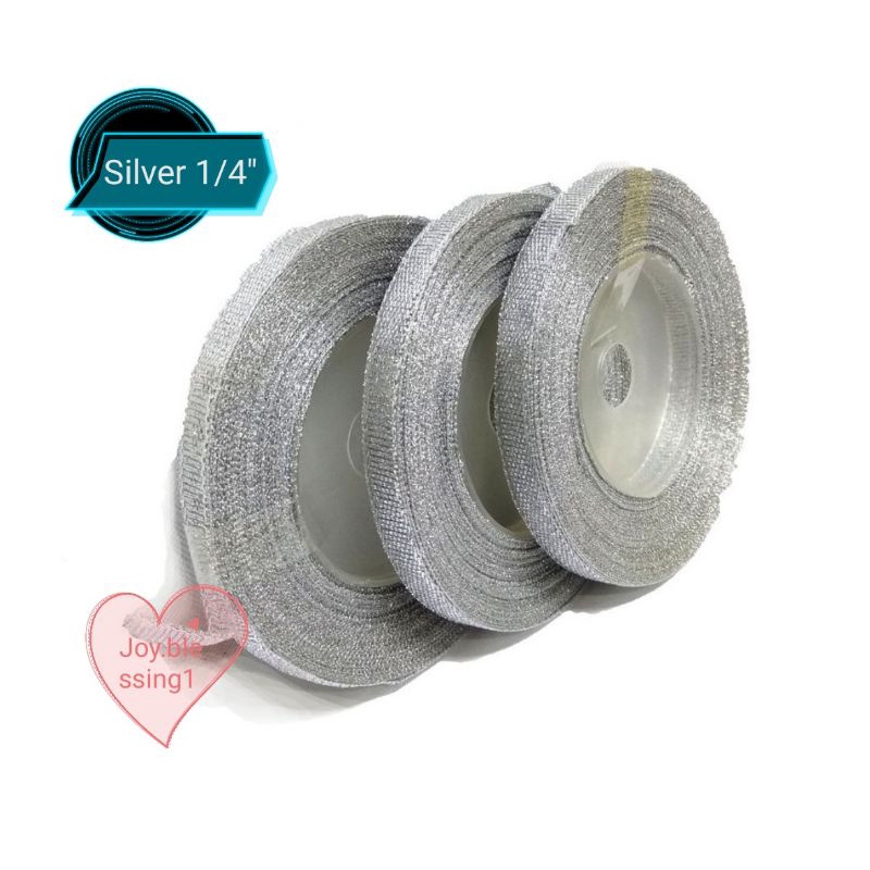 

PITA PERAK SILVER GLITTER 1/4" (0,6 CM) ECER PER ROLL