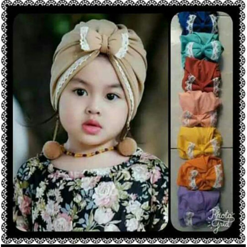 

turban pita renda pompom