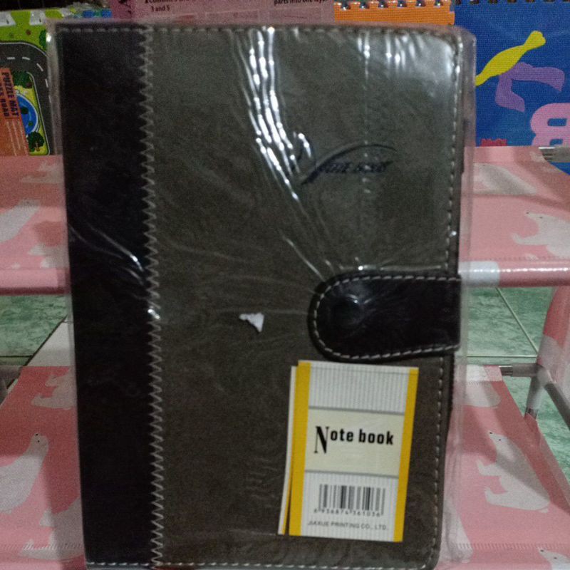 

notebook / buku catatan kancing