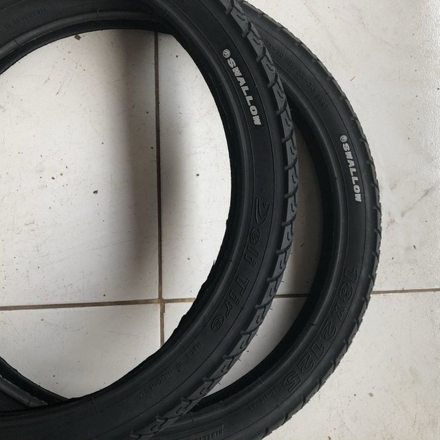 Ban Luar Tire Sepeda 18 x 2.125 HITAM. SWALLOW / DELI TIRE