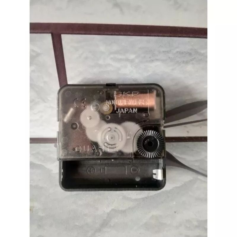 mesin jam dinding Skp transparan