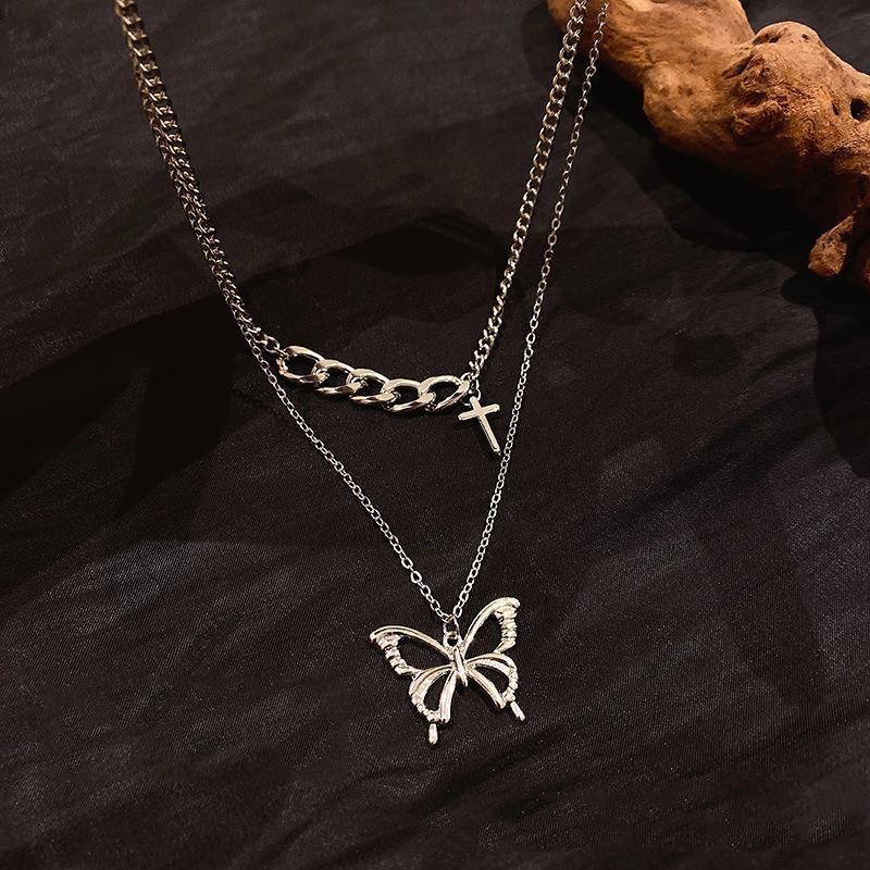 Kalung Multilayer Liontin Butterfly Cross Bahan Metal Gaya Vintage Hip Hop Untuk Wanita