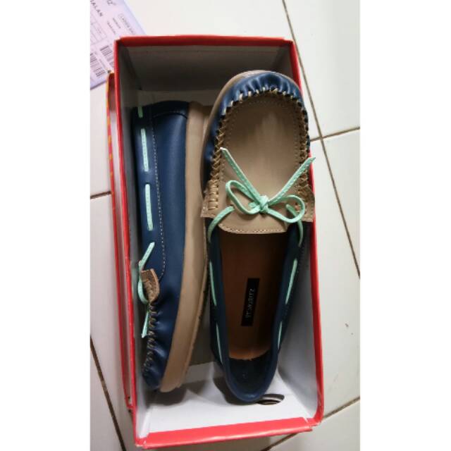 St. Moritz flat shoes.