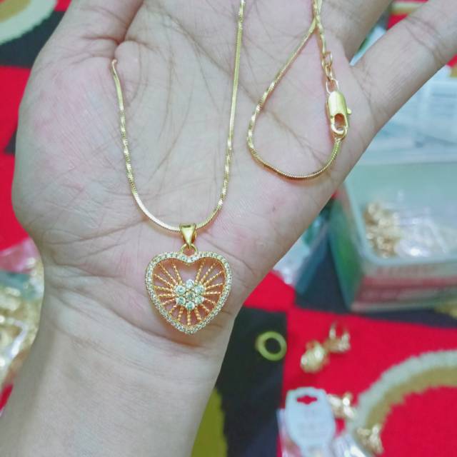 Kalung mlintir liontin love cantik titanium gold