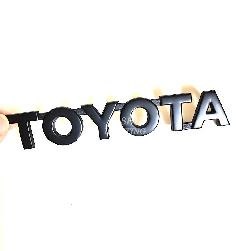 1pc Stiker Emblem Logo Toyota Hilux Bahan Abs Warna Krom / Hitam / Merah Untuk Bagasi Belakang Mobil