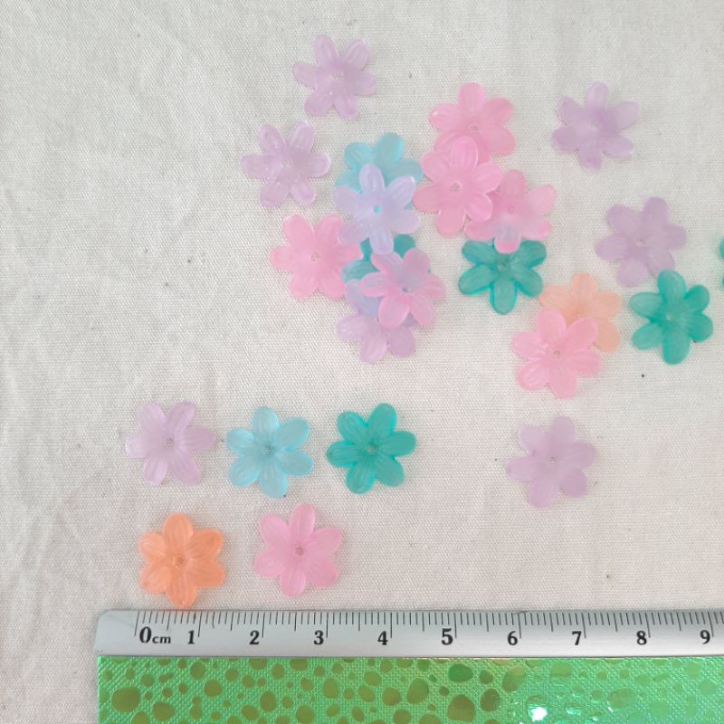 manik bunga akrilik bening