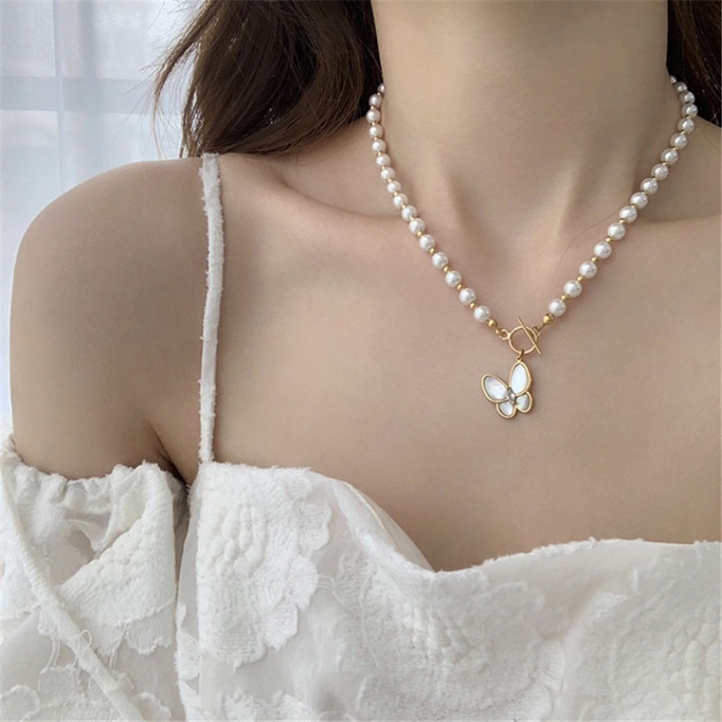 Butterfly pearl necklace