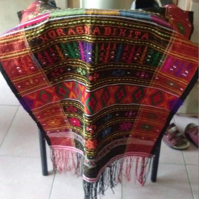 

Ulos batak besar dan berat