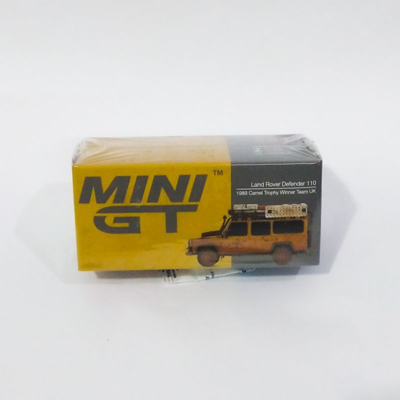 MINI GT LAND ROVER DEFENDER 110 CAMEL TROPHY DIRTY