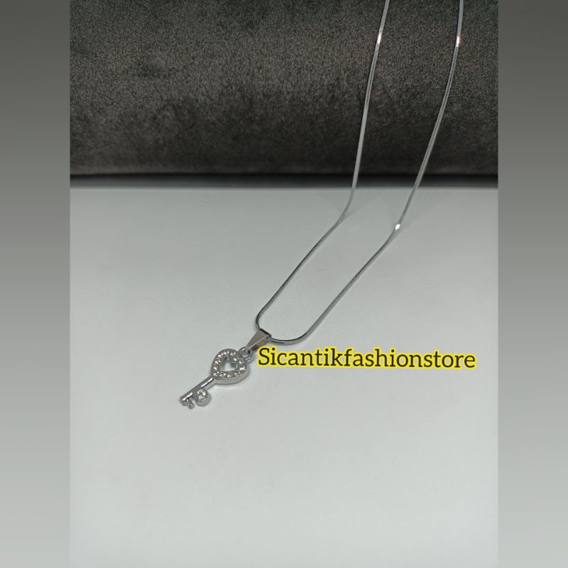 (PROMO)Kalung Titanium plus liontin Kunci Terlaris dan terbaru anti karat