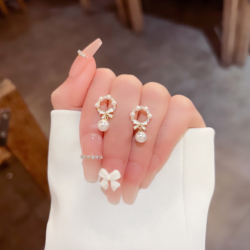 Anting Stud Desain Simpul Pita Aksen Berlian Mutiara Rosette Bahan S925 Silver Untuk Wanita