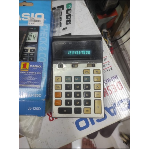 

Kalkulator Meja Casio 10 Digit Nyala Hijau ORI Made In Japan Bekas