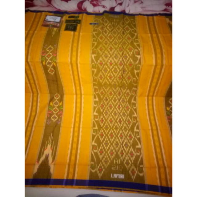 Lamiri motif keong bahan sutra
