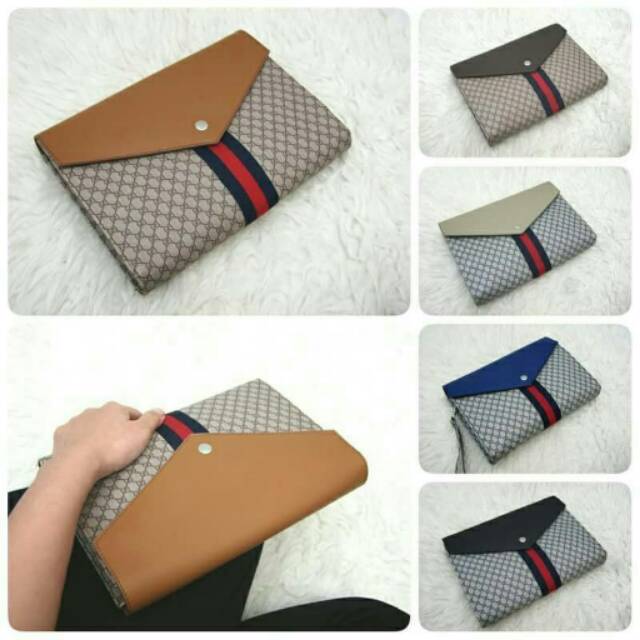 

Guci cluch amplop