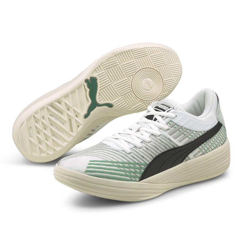 grey and green puma shoes