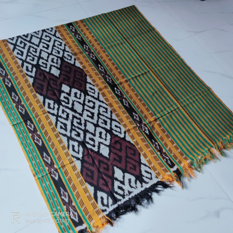 KAIN ETNIK TENUN ETNIK TORAJA