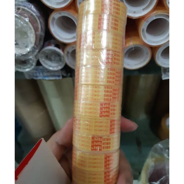 Isolasi bening gold tape (per 3 gulung)Uk 1/2 inchi