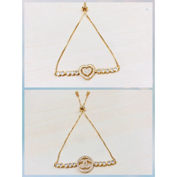 Gelang serut wanita xuping berlapis emas dengan mata zircon.