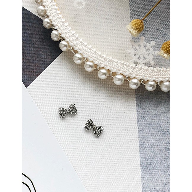 LRC Anting Tusuk Fashion Small Bow Pearl-studded Earrings D27869