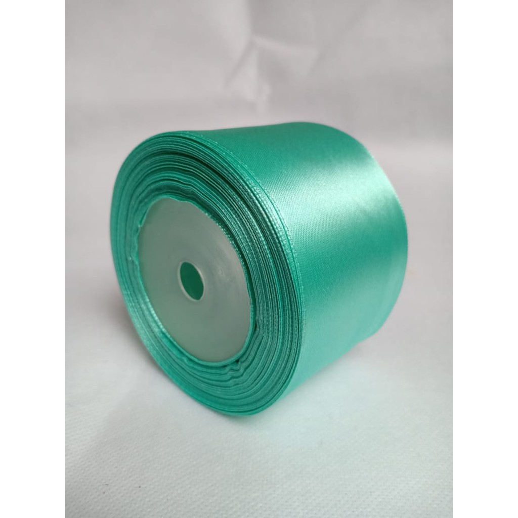 

Pita satin hijau tosca 1,5 inch / 4 cm Per roll