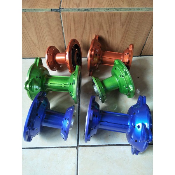 tromol buat motor klx150/bf/dtraker150(sepasang)36 hole ,tersedia warna biru/oren/hijau/hitam/silver