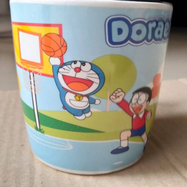 Promo MUG gelas keramik doraemon  edisi sport Shopee 