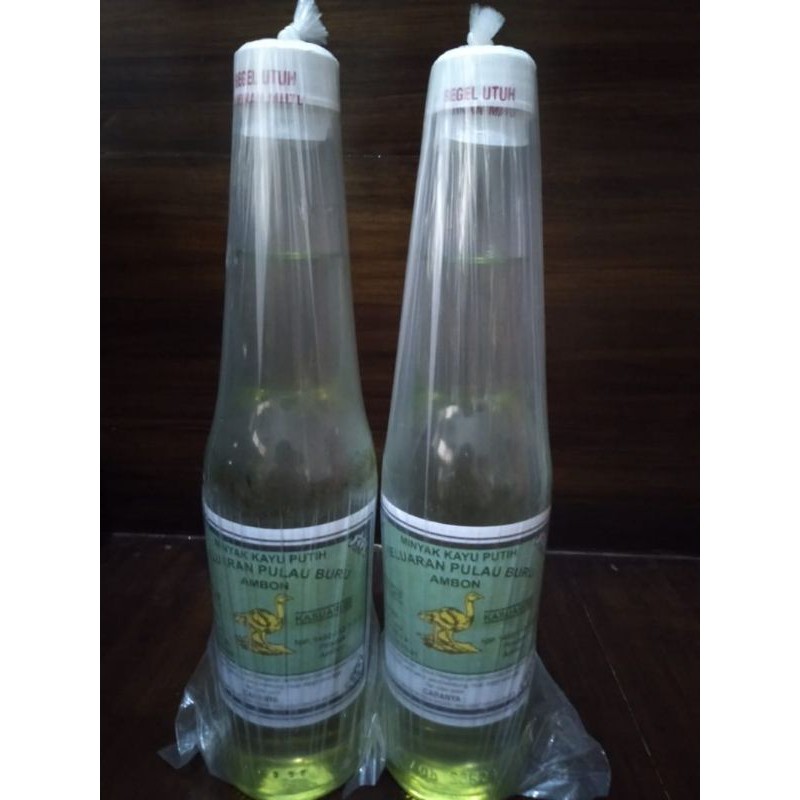 Minyak kayu putih pulau buru ambon maluku original asli botol tutup putih ukuran 250 ml