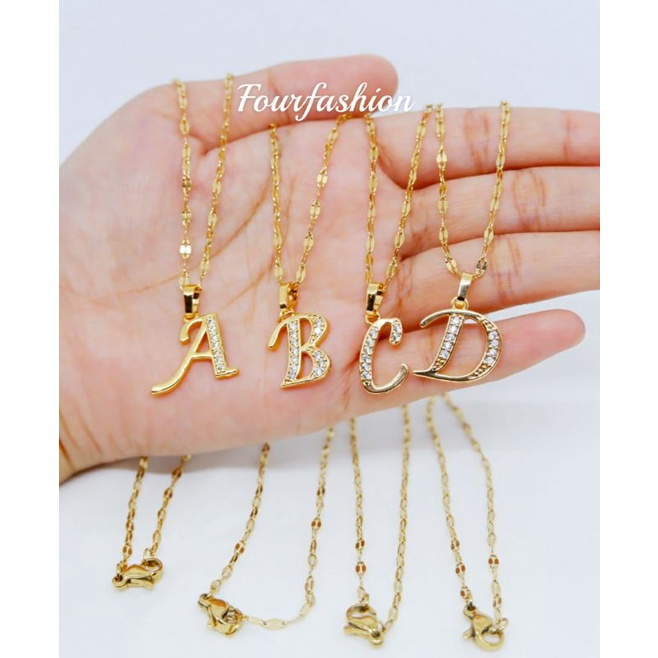 Fourfashion Kalung Titanium Liontin Huruf Xuping Lapis Emas