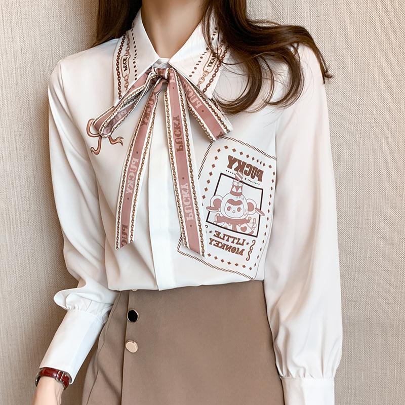 Autumn 2021 new women's French retro shirt women's Lantern Sleeve bow long sleeve chic design top