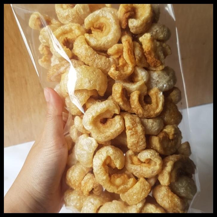 

DISKON TERBATAS !!! KERUPUK BABI/KRUBI/KERUPUK KULIT BABI SAMCAN OPIG 250GR TERLARIS