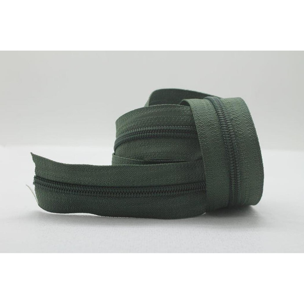 

Jual Zipper Nylon / Resleting no. 5 Gerigi Plastik Hijau Army Diskon