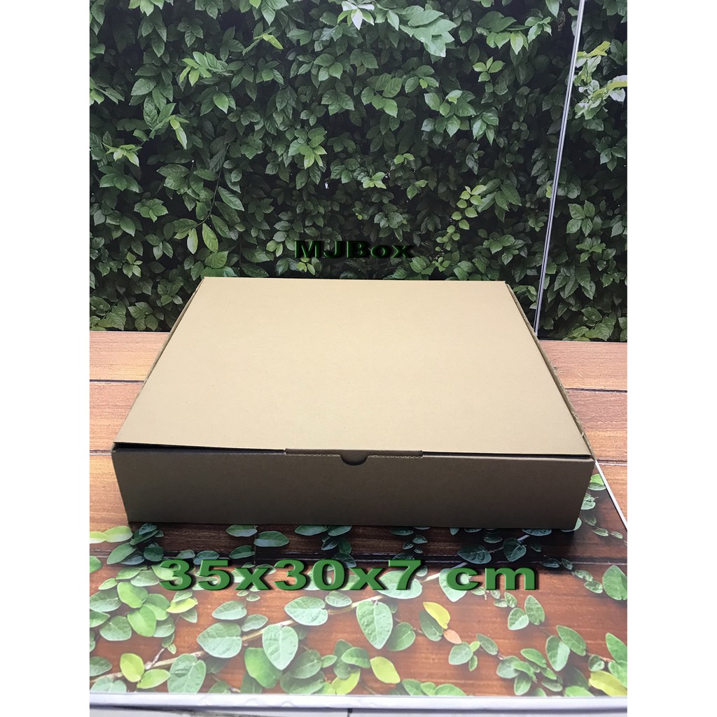 

Kardus Uk. 35x30x7 cm......Die cut untuk packing aksesoris dll, model box pizza