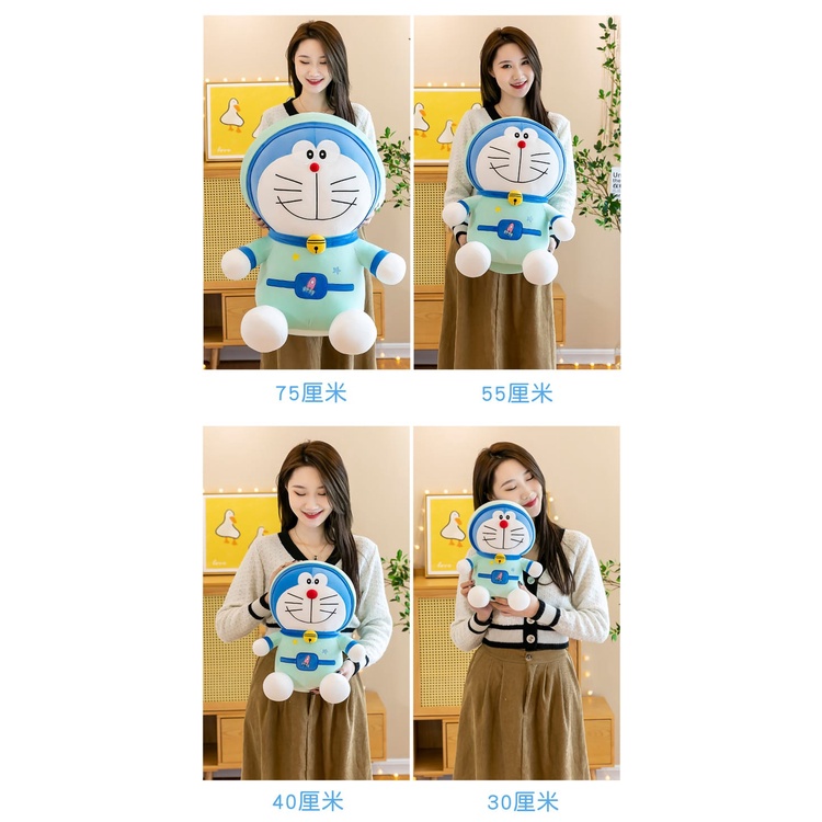 Boneka doraemon kostum tertawa bahagia bahan plush