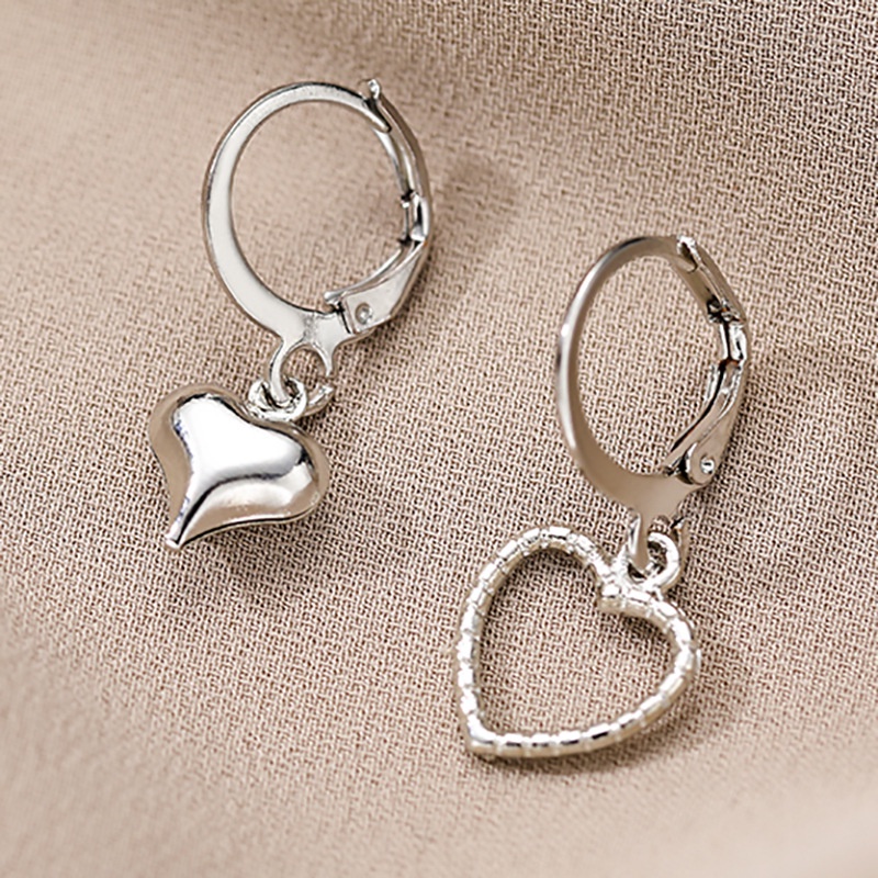 Anting Tusuk Asimetris Model Hati Hollow Gaya Retro Simpel Untuk Wanita