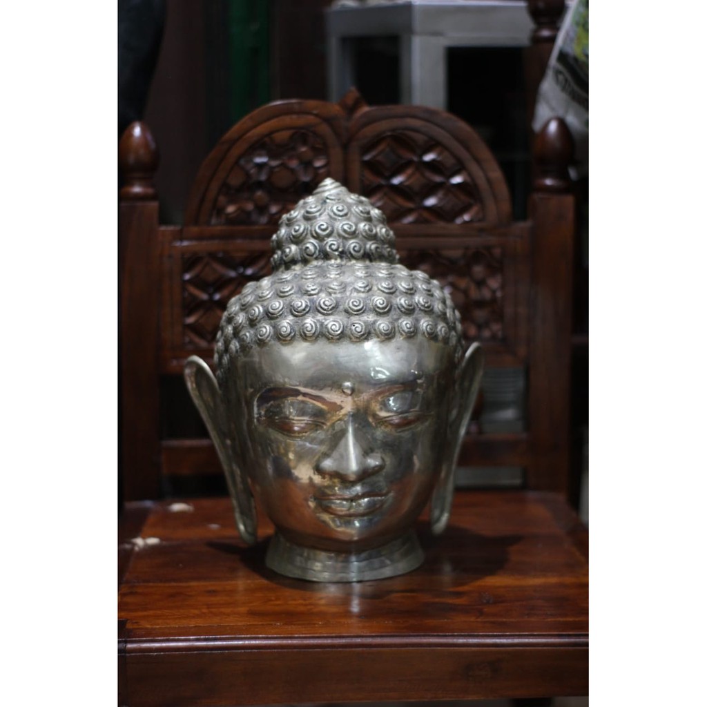 PATUNG KEPALA BUDHA KUNINGAN