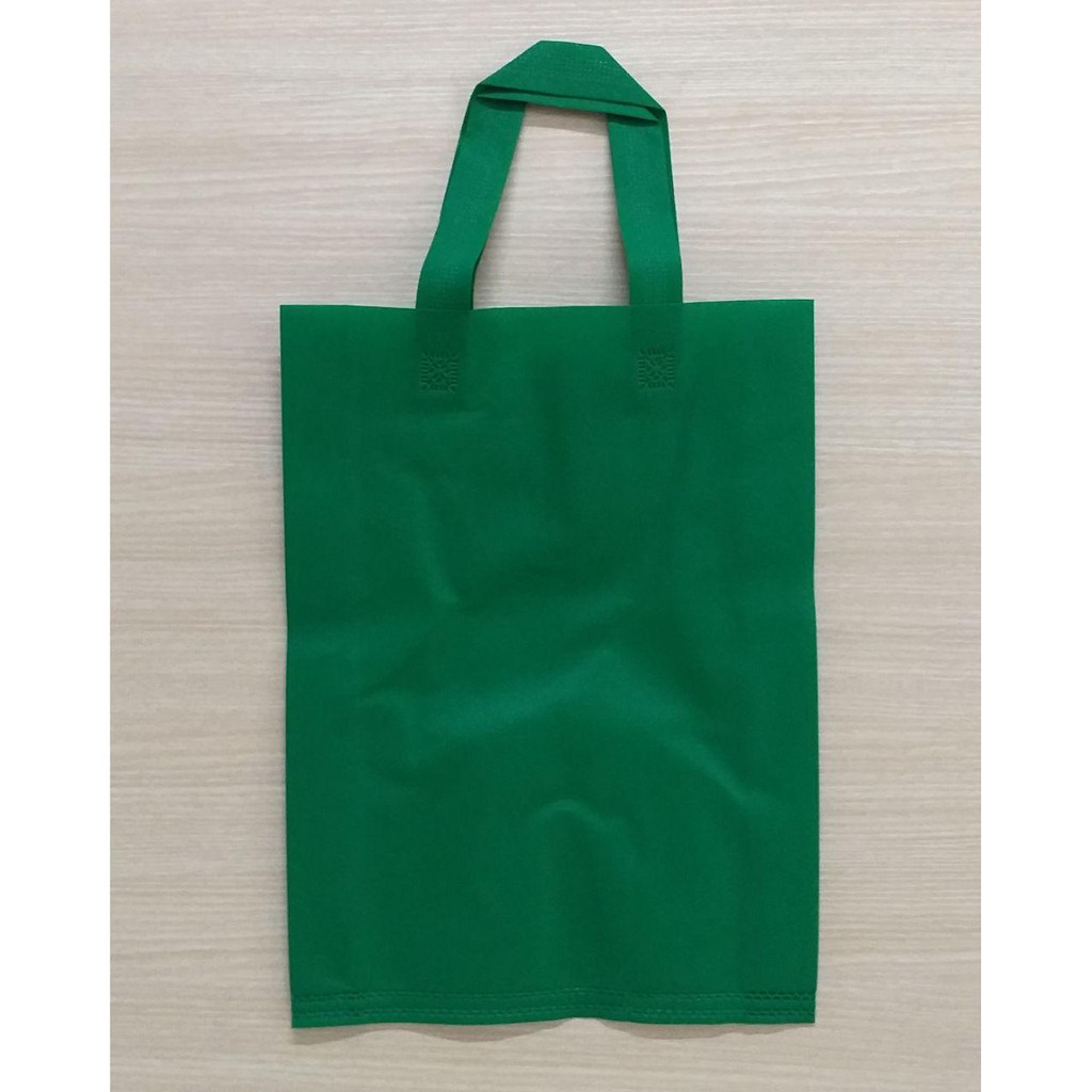 

GOODIE BAG SPUNBOND HANDLE 30x40 (Per Lusin) / Tas Belanja Murah / Kantong Belanja / Souvenir