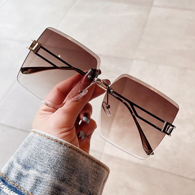 Kacamata Hitam Oversized Tanpa Bingkai Bentuk Kotak Model Hollow Bahan Metal Gaya Korea Untuk Wanita