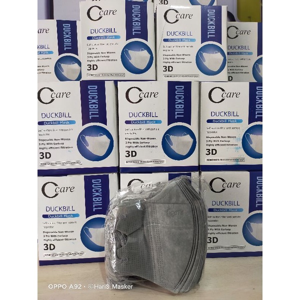 Masker duckbill c care ABU garis embos isi 50
