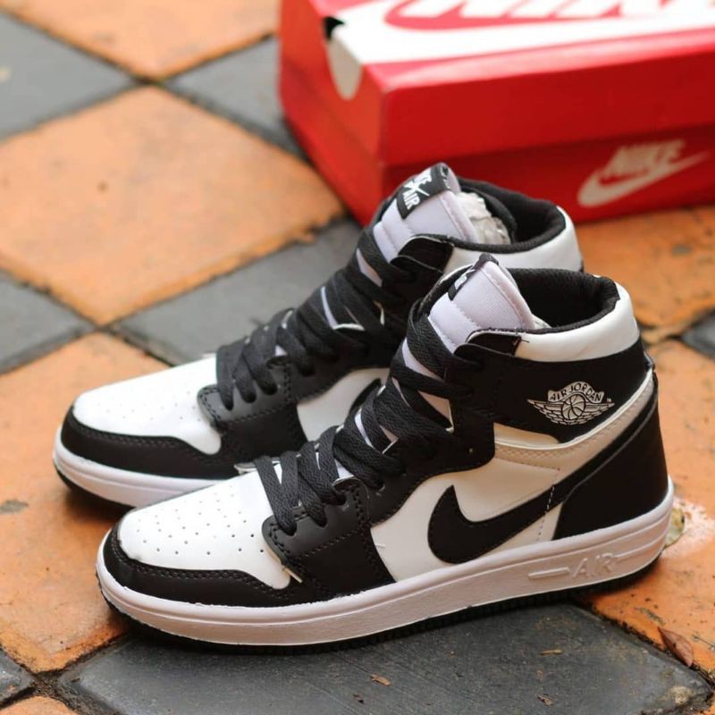 black white nike jordan