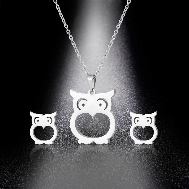 Eropa dan Amerika fashion kalung liontin set kepribadian burung hantu glossy stainless steel sweter