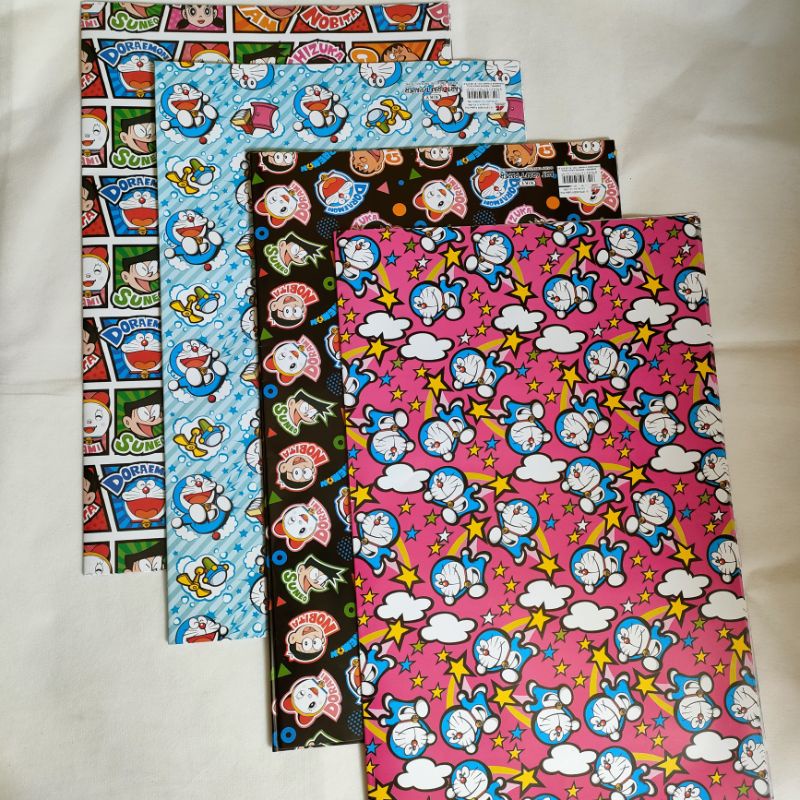 

kertas kado Kiky isi 25 lembar