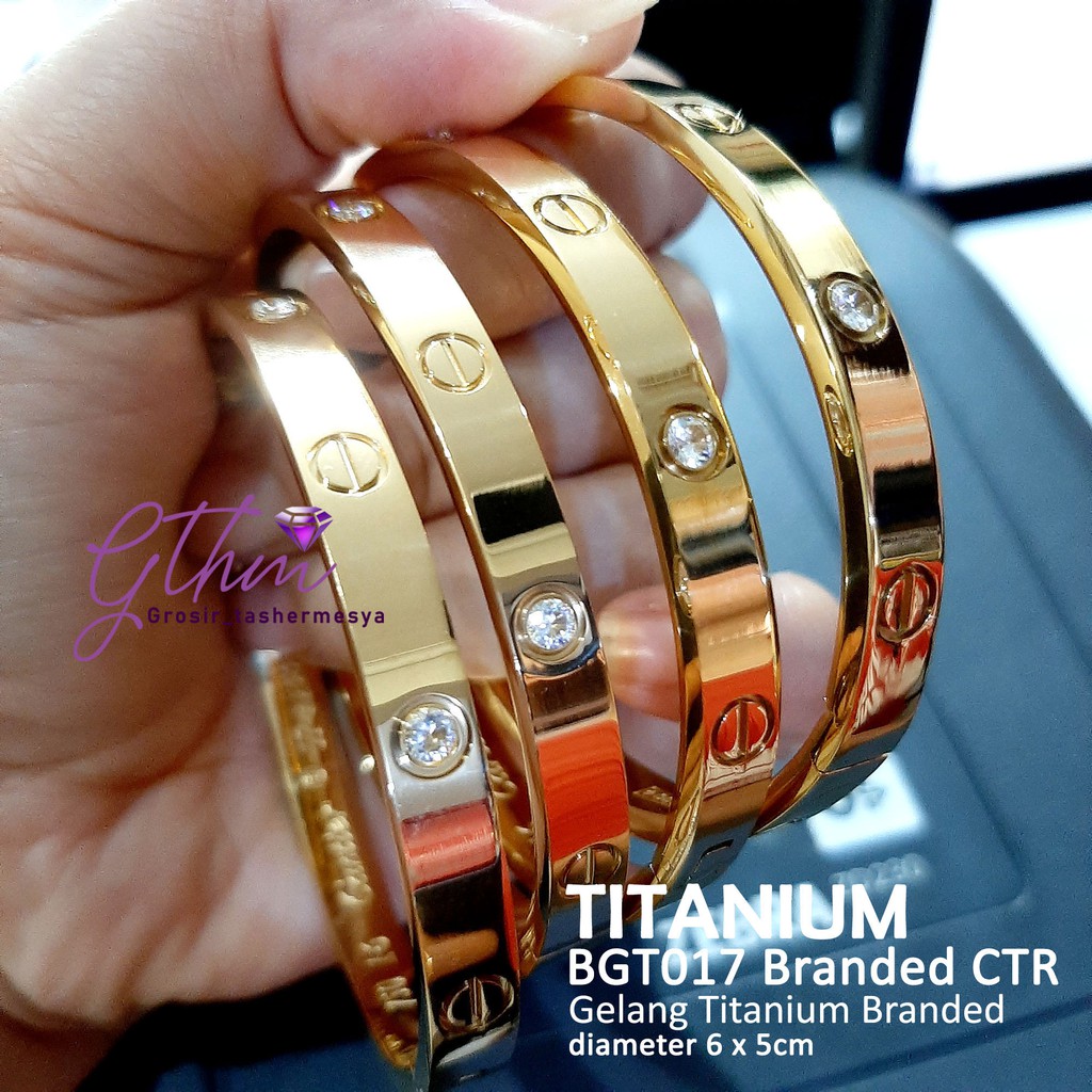 Gelang titanium cap 750 permata bgt077