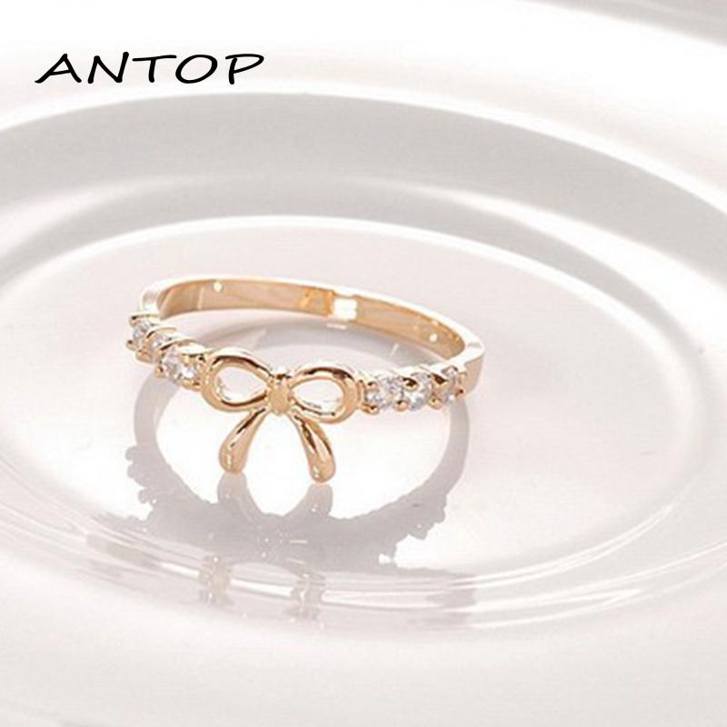 Cincin Korea Emas Cincin titanium Pria Wanita aesthetic keren Desain Pita Aksen Berlian Ring Jewelry ANTOP