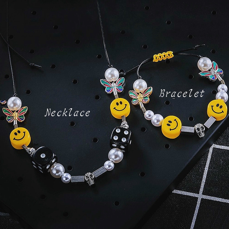 19157Silver Skull Butterfly Ceramic Smiley Necklace，Hip hop trend dice couple bracelet