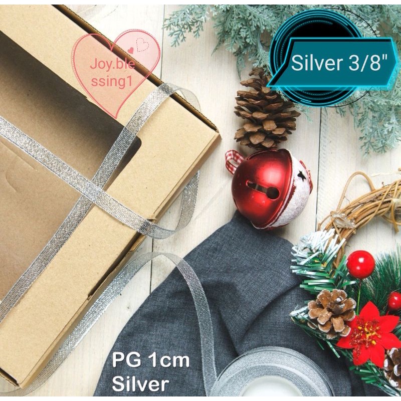 

PITA PERAK SILVER GLITTER 3/8" 9.5 MM ECER PER ROLL